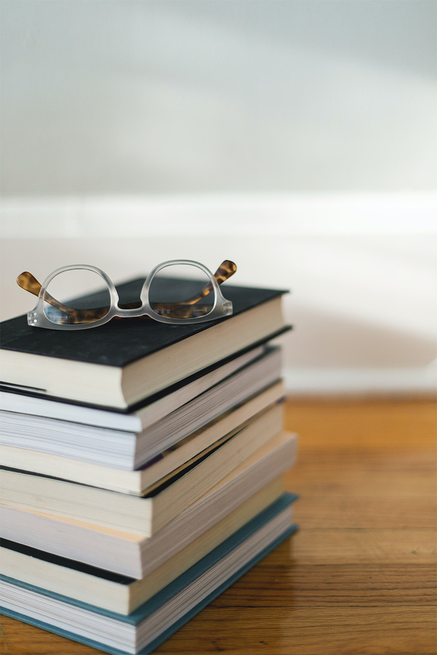Book stack with glasses