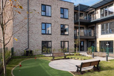Garden area with putting green at Glencorse Care Home