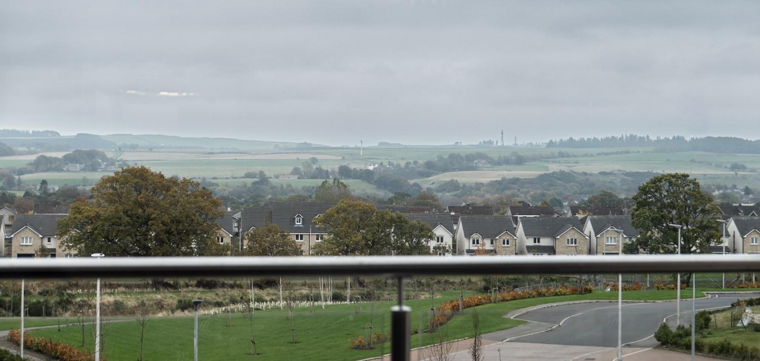 view of edinburgh from the balcony at glencorse care home