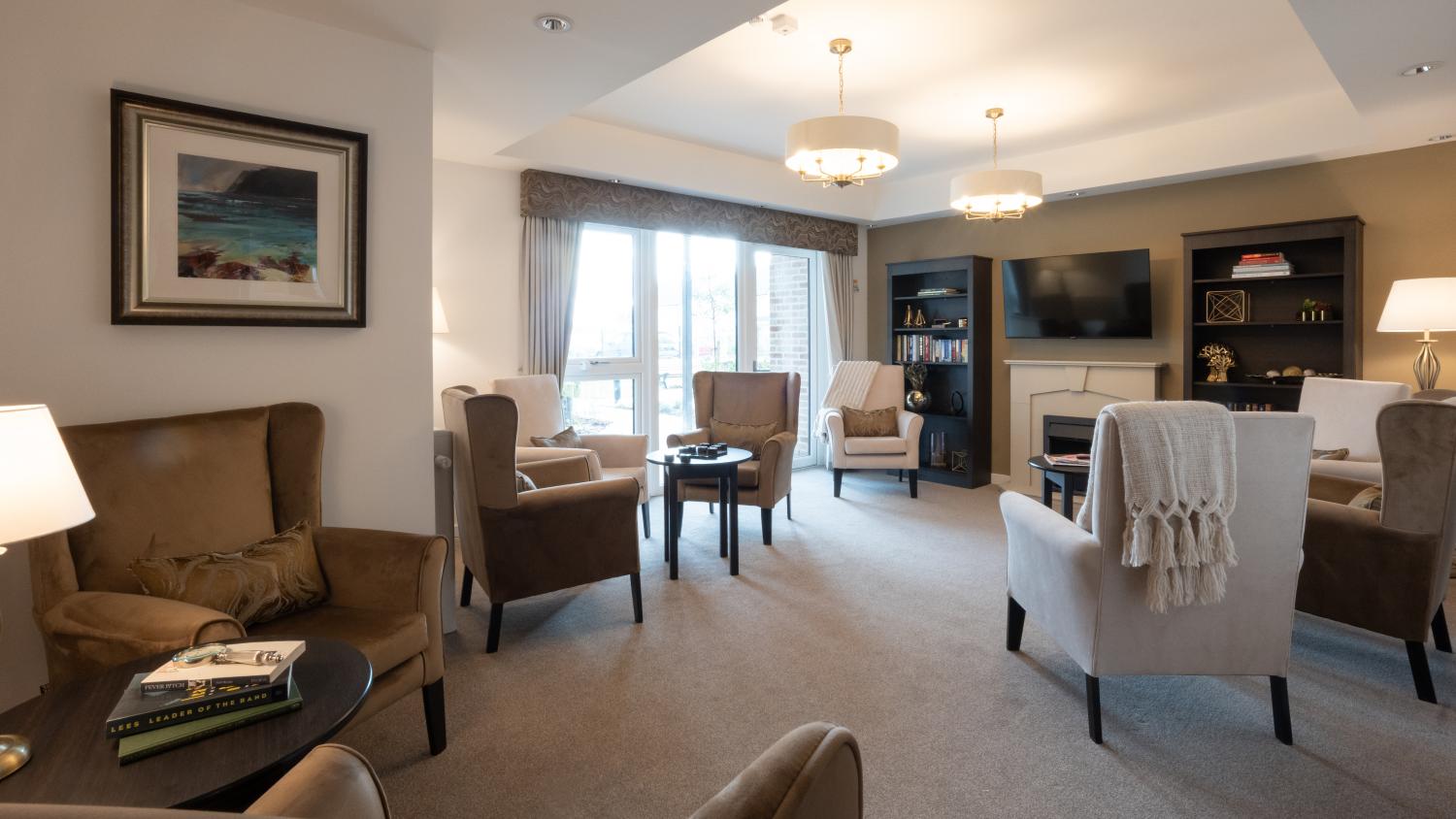 care home lounge with sofas and armchairs