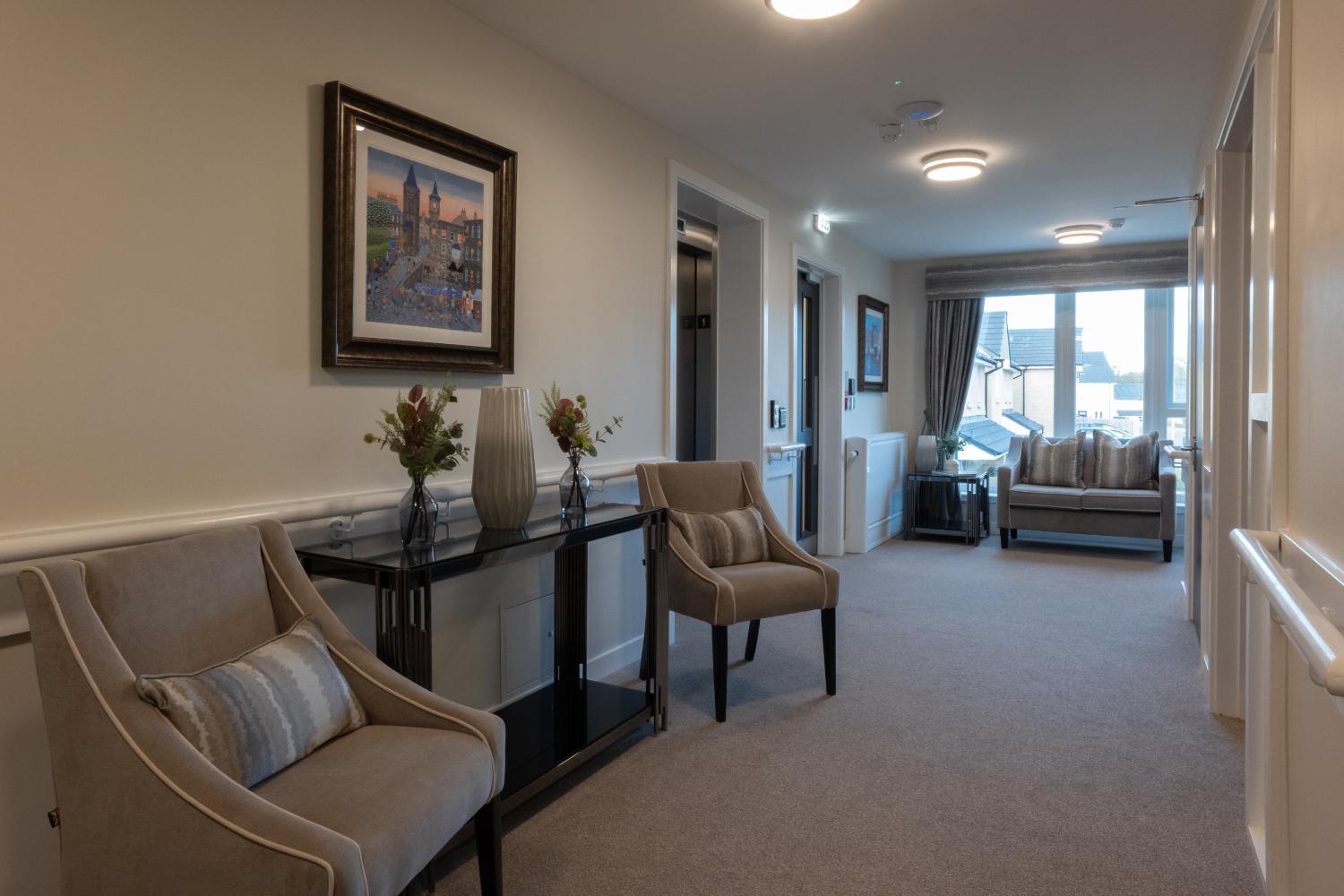 hallway with armchairs