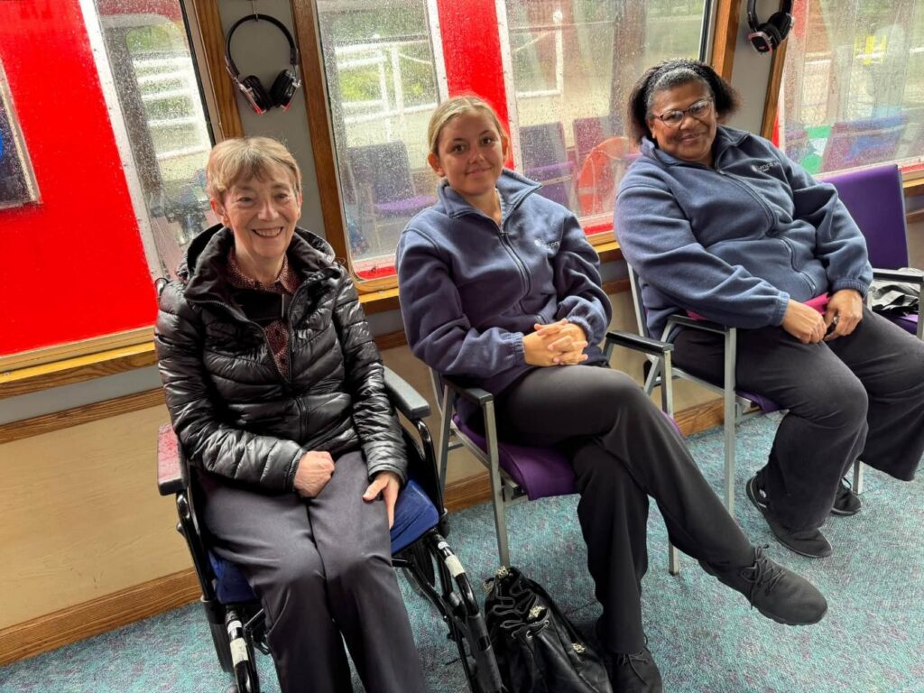 elderly women smiling on a boat